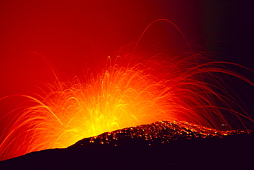 Hawaii, Big Island, Hawaii Volcanoes National Park, Close-up of molten lava explosion, vibrant orange C1629