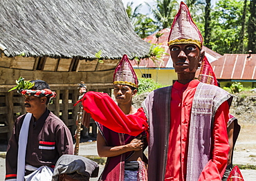 Toba Batak people performing a Sigale Gale puppet dance with a life-sized wooden puppet standing on a platform at Huta Bolon Museum in Simanindo village on Samosir Island, Lake Toba, North Sumatra, Indonesia