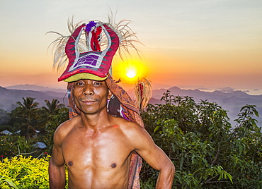 Manggarai man wearing a traditional headdress wrapped with cloth used in caci, a ritual whip fight, Melo village, Flores, East Nusa Tenggara, Indonesia