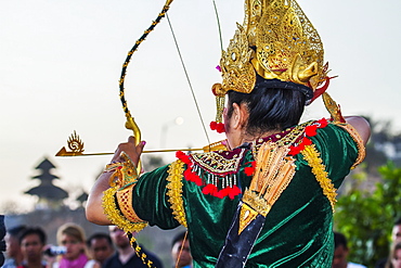 Balinese dancer using codified hand positions and gestures during a Kecak dance performance, Ulu Watu, Bali, Indonesia