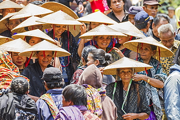 People in a formal funeral procession called Maâ€™passa Tedong at a rante, the ceremonial site for a Torajan funeral, in Sereale, Toraja Land, South Sulawesi, Indonesia