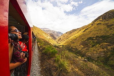 People on the viewing platform of the Observation car of the Tren Crucero train, Nariz del Diablo (Devil's Nose), Chimborazo, Ecuador