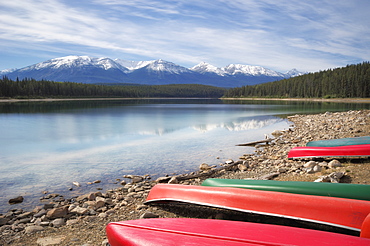 Canoes Along The Shore Of Patricia Lake - The Canadian Rocky Mountains, Jasper National Park, Alberta, Canada