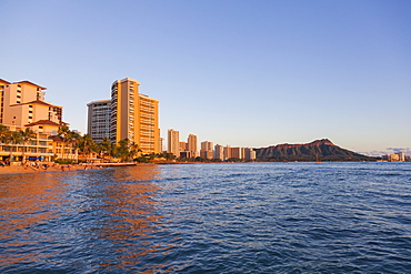 Skyline view of Waikiki Beach and Diamond Head Crater viewed from the ocean; Honolulu, Oahu, Hawaii, United States of America