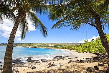 Four Seasons Resort overlooking the golden beach and palm trees at Hulopo'e Beach Park, Lanai, Hawaii, United States of America