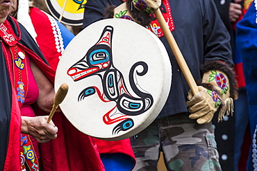 People at the Tlingit Celebration, participants are entering the hall to traditional drumming, Teslin, Yukon, Canada