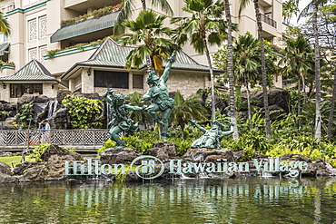 Hula Kahiko dancer statues at Hilton Hawaiian Village, Waikiki, Honolulu, Oahu, Hawaii, United States of America