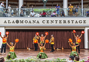 Hula dancers entertaining shoppers at the Ala Mona Shopping Center's stage in Waikiki, Honolulu, Oahu, Hawaii, United States of America