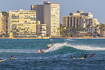 Surfing at Waikiki viewed from Magic Island, Ala Moana Beach Park, Honolulu, Oahu, Hawaii, United States of America