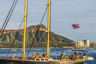 Sailing towards the Ala Wai boat harbor past Waikiki and Diamond Head, Honolulu, Oahu, Hawaii, United States of America