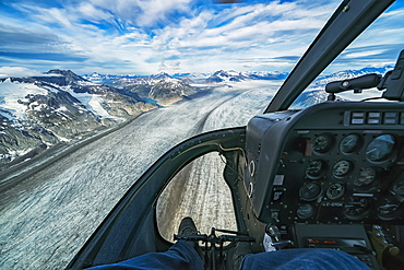 Flying in a helicopter over the icefields in Kluane National Park, near Haines Junction, Yukon, Canada