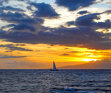 Sailboat in the ocean off the coast of Kamaole One and Two beaches, Kamaole Beach Park, Kihei, Maui, Hawaii, United States of America