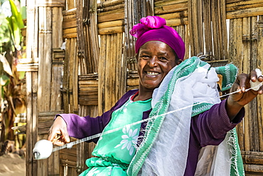 Dorze woman spinning cotton, Dorze village, Southern Nations Nationalities and Peoples' Region, Ethiopia