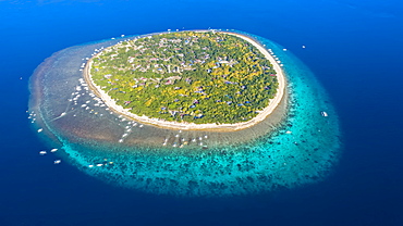 An aerial view of Balicasag Island, a tiny island in South West Bohol in the central Philippines. It is famous for scuba diving on the deep, vertical walls and there are some fantastic hard coral gardens at snorkeling depths, Balicasag Island, Philippines