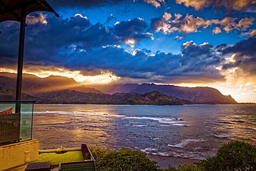 Golden sunset at Hanalei Bay, viewed from The St. Regis Princeville Resort, Princeville, Kauai, Hawaii, United States of America