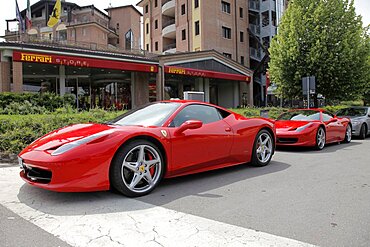 Red Ferrari 458 cars and store, Maranello, Emilia-Romagna, Italy, Europe