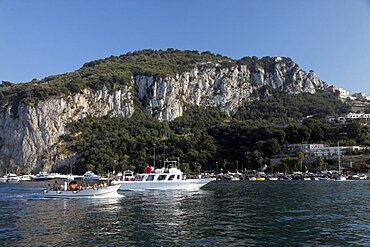 Pleasure boats arriving at Harbour, Capri, Campania, Italy, Europe