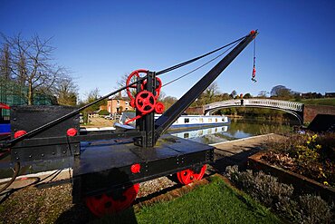 Black crane and white bridge, Northamptonshire, England, United Kingdom, Europe