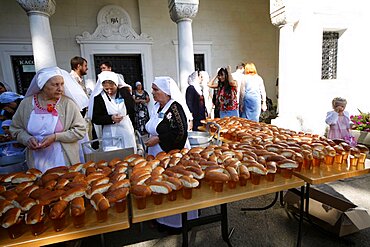 Nuns give out bread at Romanov Chapel of the Holy and Life-giving Cross, Yalta, Crimea, Ukraine, Europe