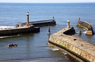 Lighthouse and Pier, Whitby, North Yorkshire, Yorkshire, England, United Kingdom, Europe