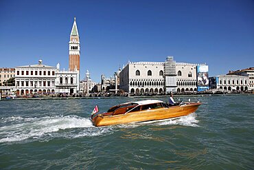 Speed boat, Campanile of San Marco, Doge's Palace from the Dogana, Venice, UNESCO World Heritage Site, Veneto, Italy, Europe