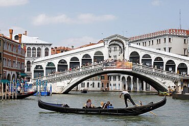 Rialto Bridge and gondola, Venice, UNESCO World Heritage Site, Veneto, Italy, Europe