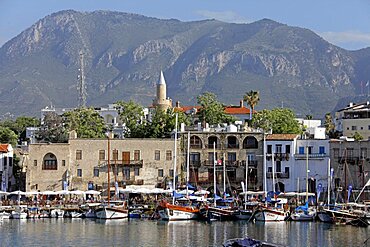 Boats in harbour and minaret, Kyrenia, Northern Cyprus, Mediterranean, Europe