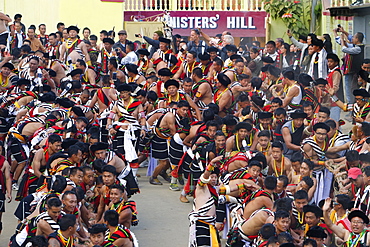 Naga tribesmen participating at the Stone pulling ceremony during Kisima Nagaland Hornbill festival, Kohima, Nagaland, India, Asia