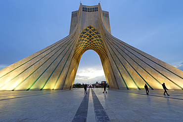 Azadi Tower (Freedom Monument) formerly known as Shahyad Tower and cultural complex at sunset, Tehran, Islamic Republic of Iran, Middle East