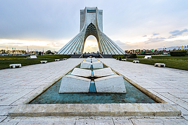 Azadi Tower (Freedom Monument) formerly known as Shahyad Tower and cultural complex at sunset, Tehran, Islamic Republic of Iran, Middle East