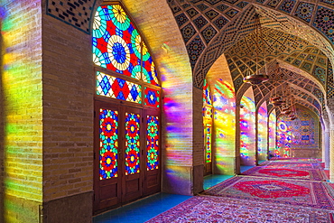 Nasir-ol-Molk Mosque (Pink Mosque), light patterns from colored stained glass illuminating the iwan, Shiraz, Fars Province, Iran, Middle East