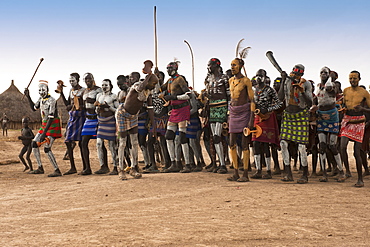 Karo people with body paintings participating in a tribal dance ceremony, Omo River Valley, Southern Ethiopia, Africa 