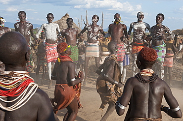 Karo people with body paintings participating in a tribal dance ceremony, Omo River Valley, Southern Ethiopia, Africa 