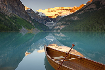 Canoe on Lake Louise at sunrise, Banff National Park, UNESCO World Heritage Site, Alberta, Rocky Mountains, Canada, North America 