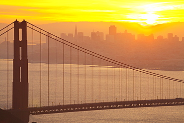 Sillouette of the Golden Gate Bridge and San Francisco skyline at sunrise, San Francisco, California, United States of America, North America