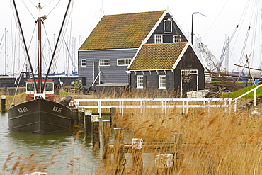 Boats and building in the Zuidersee Open-Air Museum, Enkhuizen, North Holland, Netherlands, Europe