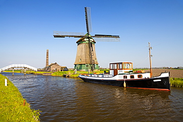 Traditional Windmill beside a Canal, near Obdam, North Holland, Netherlands, Europe