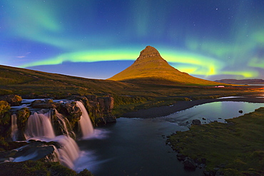 Aurora (Northern Lights) over a moonlit Kirkjufell Mountain, Snaefellsnes Peninsula, Iceland, Polar Regions