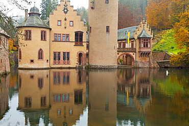 Schloss (Castle) Mespelbrunn in autumn, near Frankfurt, Germany, Europe 