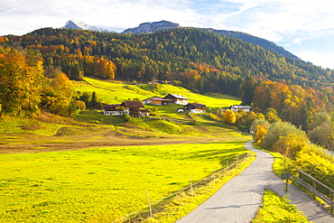 Bicycle path through rural mountain landscape in autumn, near Berchtesgaden, Bavaria, Germany, Europe 