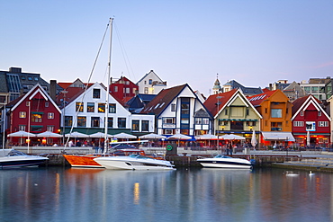 Stavanger's picturesque harbor illuminated at dusk, Stavanger, Rogaland, Norway, Scandinavia, Europe