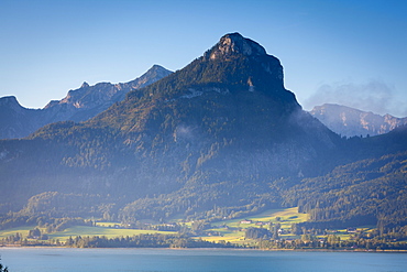 Elevated view over Wolfgangsee lake and rural landscape at sunrise, Flachgau, Salzburg, Upper Austria, Austria, Europe