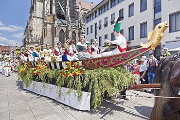 Fisher women on a boat in historical costumes at a parade at the Munsterplatz square, Fischerstechen, Ulm, Baden Wurttemberg, Germany, Europe