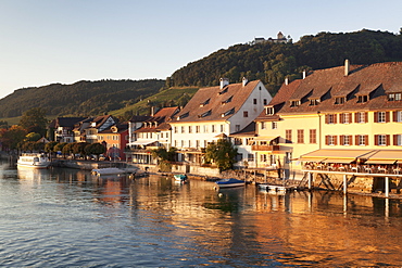 Old town along the Rhine promenade with Burg Hohenklingen castle at sunset, Stein am Rhein, Canton Schaffhausen, Switzerland, Europe