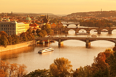 Vltana River with the bridges, Charles Bridge (UNESCO World Heritage Site) and the Old Town Bridge Tower at Sunrise, Prague, Bohemia, Czech Republic