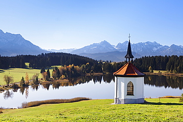 Chapel at Hergratsrieder See lake with Allgau Alps, near Fussen, Allgau, Ostallgau, Bavaria, Germany, Europe 