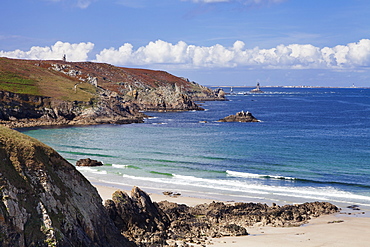 View from Baie des Trepasses to the lighthouse at Pointe du Raz and the Isle de Sein, Peninsula Sizun, Finistere, Brittany, France, Europe 