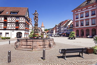 Roehrbrunnen Fountain at the market square, town hall and Obertorturm tower, Gengenbach, Kinzigtal Valley, Black Forest, Baden Wurttemberg, Germany, Europe