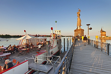 Statue of Imperia by Peter Lenk at the seaport, restaurant on a ship, Konstanz, Lake Constance, Baden-Wurttemberg, Germany, Europe