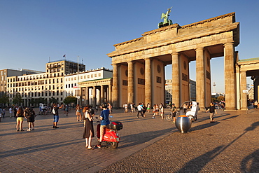 Brandenburg Gate (Brandenburger Tor) at sunset, Platz des 18 Marz, TV Tower, Berlin Mitte, Berlin, Germany, Europe